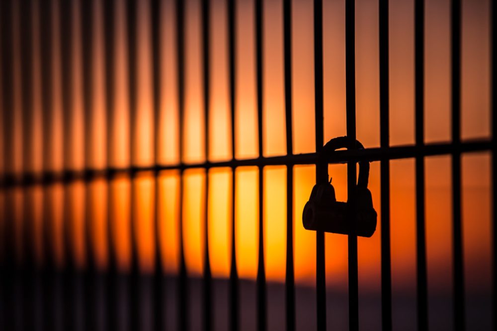 padlock on fence