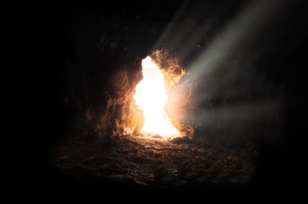 cave with light shining in