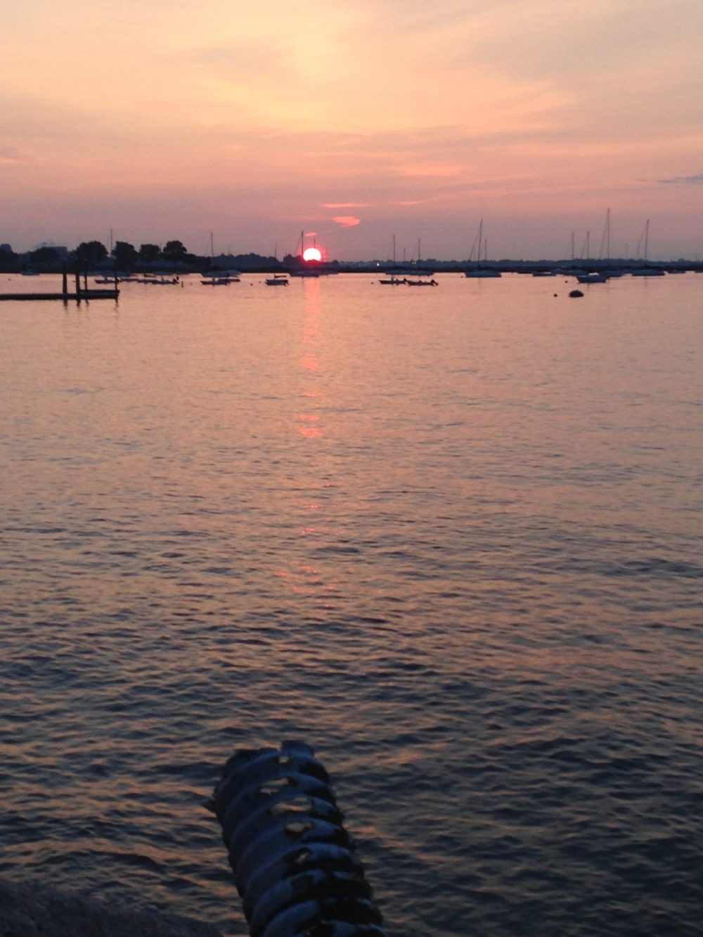 pink water and sun set